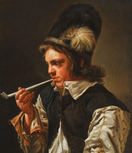 A Young Man Smoking a Pipe